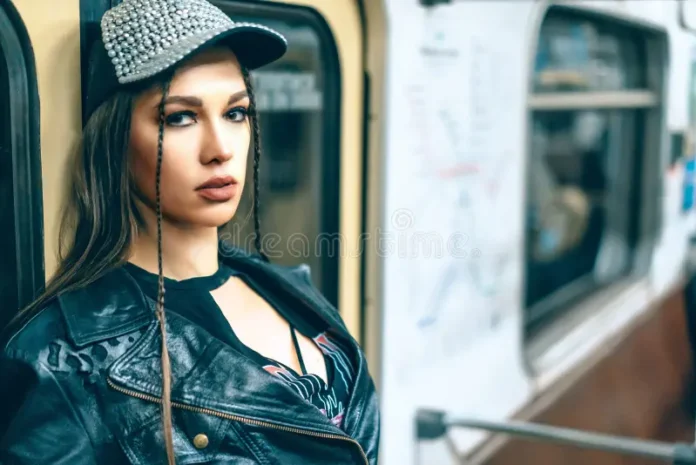 punk-girl-rock-style-fashion-gazes-to-camera-woman-passenger-subway-car-close-up-punk-girl-rock-style-fashion-gazes-236600491